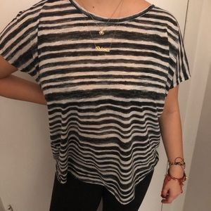 Black and whit horizontal stripes shirt.